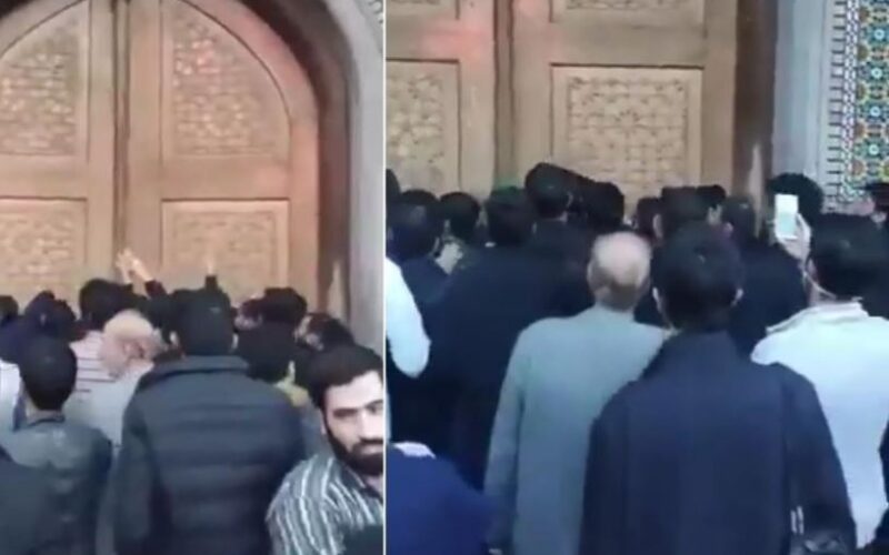 شاهد : إيرانيون يحاولون اقتحام “مزار” ديني مغلق بسبب “كورونا” في مدينة قم!
