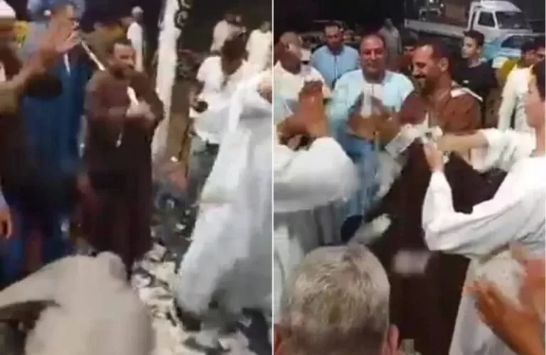 شاهد فيديو يثير الجدل لـ مصريون يلقون أموال طائلة على شخص يدعى أبو حربي على أنغام الطبل والمزمار
