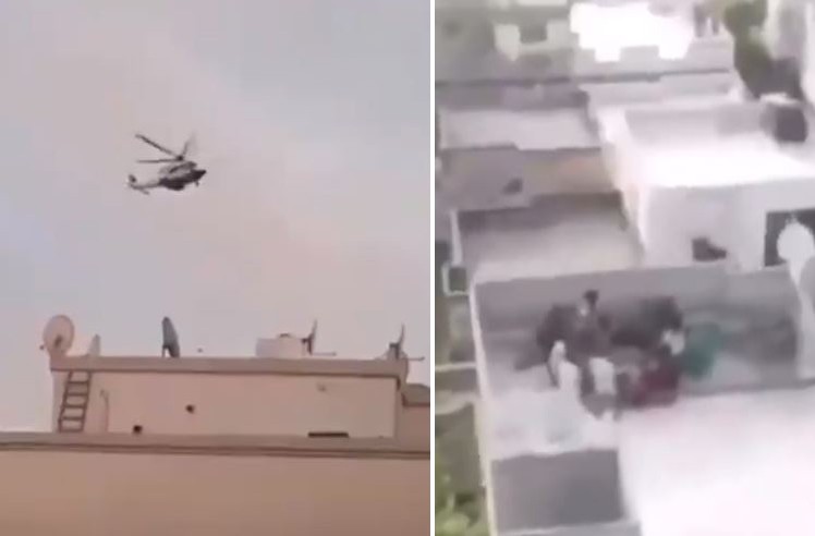 باغتتهم فجأة أثناء مخالفتهم للحجر المنزلي.. شاهد: رد فعل عمالة فوق سطح منزل بدبي بعد مداهمة هليكوبتر الشرطة
