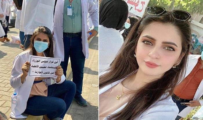 بالصور: طبيبة عراقية حسناء تطالب بوظيفة على رصيف شارع في بغداد تخطف الأنظار بجمالها
