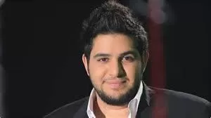 بعد غياب طويل .. هكذا ظهر نجم طيور الجنة السابق (محمد بشار) في آخر إطلالة له مع زوجته على الشاطئ وبملابس بحرية جريئة. (صورة)