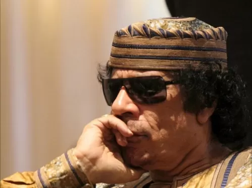 بالفيديو: الكشف عن اشياء غريبة حدثت لجهة القذافي اثناء تكفينه وهذا ما حصل بالتفصيل على لسان شاهد عيان