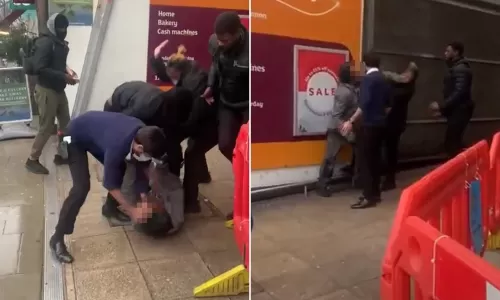 فيديو مقزز لما فعله رجل ابيض بوجه امرأة سمراء في السوبر ماركت