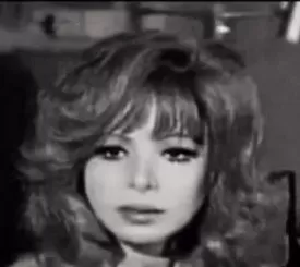 ناهد شريف تكشف كيف ابتزها مخرج فيلم ذئاب لا تأكل اللحم لتظهر في مقطع اباحي وهي عارية تماماً مع عزت العلايلي