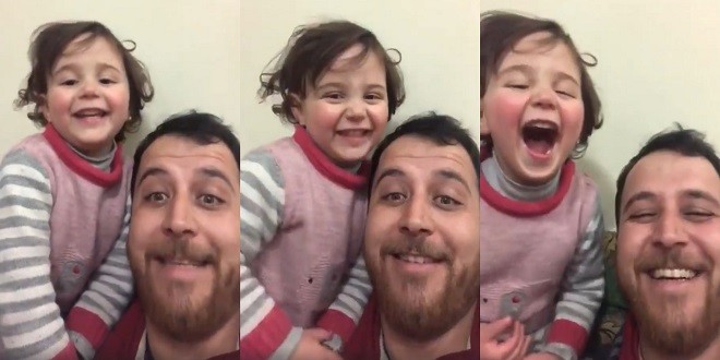 بالفيديو: أب سوري يحول ضجيج القنابل إلى ضحكات ليحمي ابنته