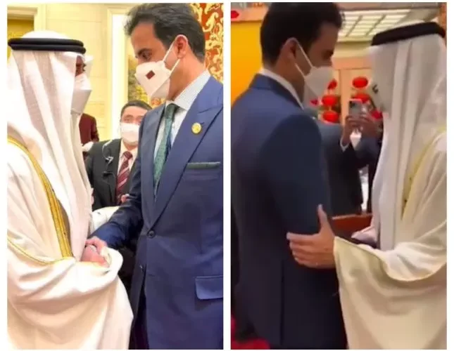 شاهد صورة مسربة من لقاء محمد بن زايد وامير قطر في الصين وكيف كانت تعابير وجه كل منهم