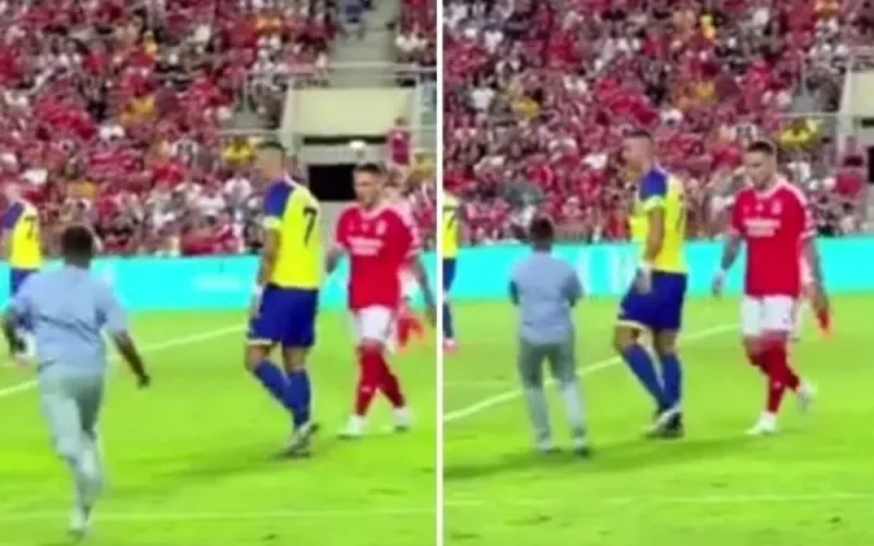 طفل يقتحم ملعب مباراة النصر وبنفيكا ويتوجه إلى رونالدو حاملا حذاء.. شاهد ردة فعل كريستيانو