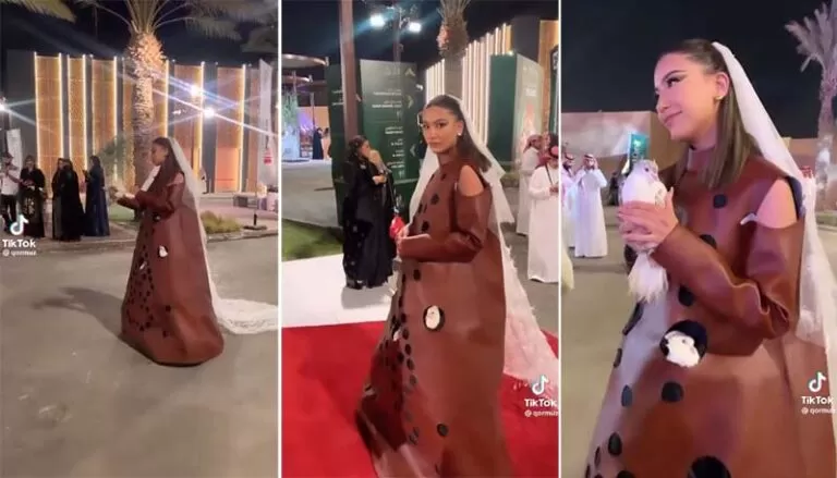 بالفيديو :  تصميم فستان لم تره من قبل  تلبسه سيده في كأس السعودية